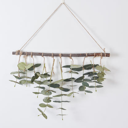Suspension murale eucalyptus artificiel sur branche