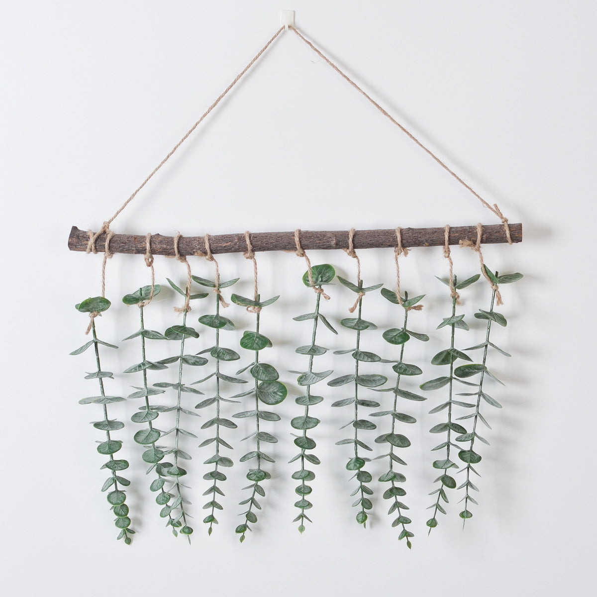Suspension murale eucalyptus artificiel sur branche