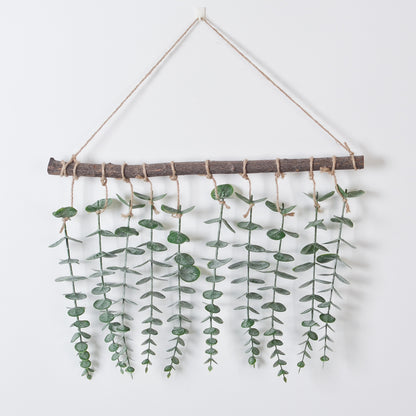 Suspension murale eucalyptus artificiel sur branche