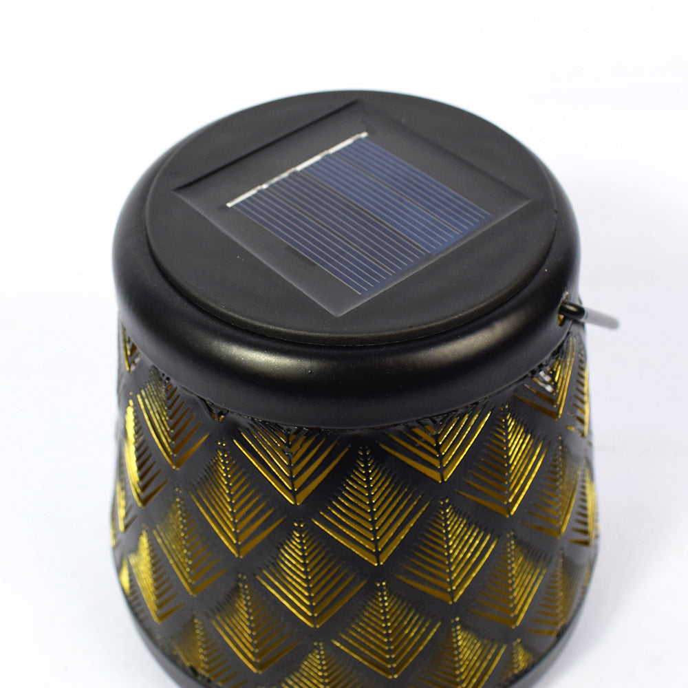 Lanterne solaire en fer ajouré, lumière chaude