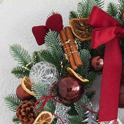 Couronne de Noël premium avec nœud et pommes de pin